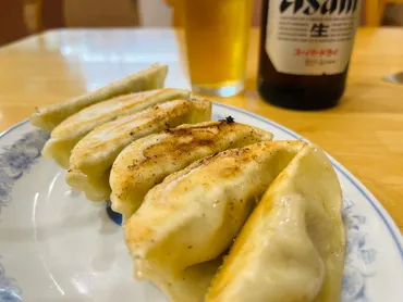 群馬老神温泉『ぎょうざの満洲 東明館』：温泉と餃子の最強タッグ！至福体験への誘い？群馬県老神温泉の隠れた名宿「ぎょうざの満洲 東明館」の魅力。